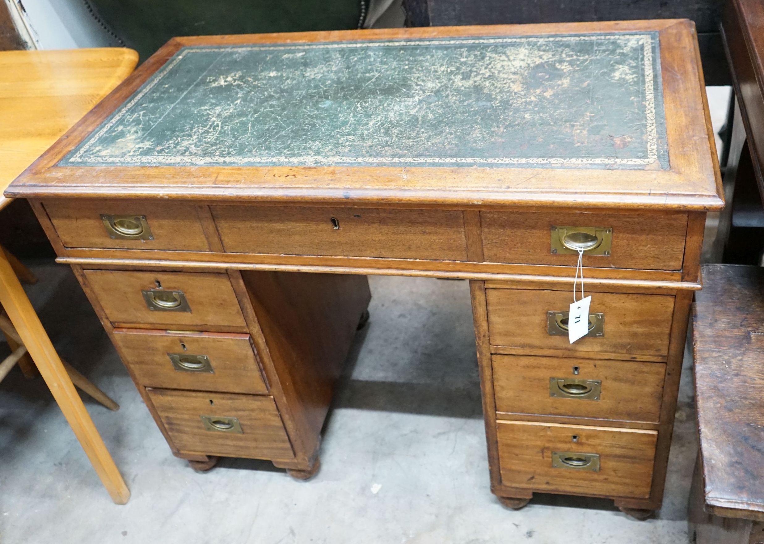 A Victorian mahogany military style pedestal desk with brass recessed handles, width 102cm, depth 56cm, height 78cm